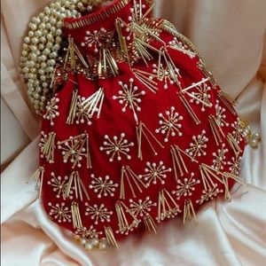 Red embroidery potli bag